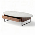 Oval coffee table with marble top and wooden base featuring storage drawers 120 x 70 x 40cm